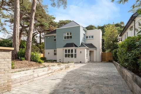 Front of house with convenient private parking