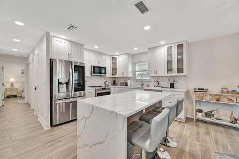 Spacious modern kitchen with large island seating