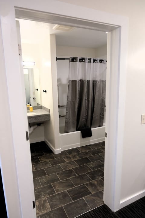 Clean, updated bathroom with walk-in tub/shower—comfortable and convenient for your Moab adventure.