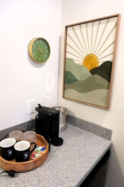 Enjoy morning coffee before heading to Arches National Park. Includes mini fridge—perfect for snacks and drinks in downtown Moab.