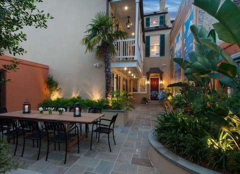 Courtyard | Outdoor Seating and Dining Area Between Both Homes | Courtyard Level