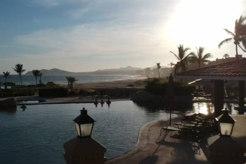 Sip your morning coffee overlooking the peaceful fountain and palms.