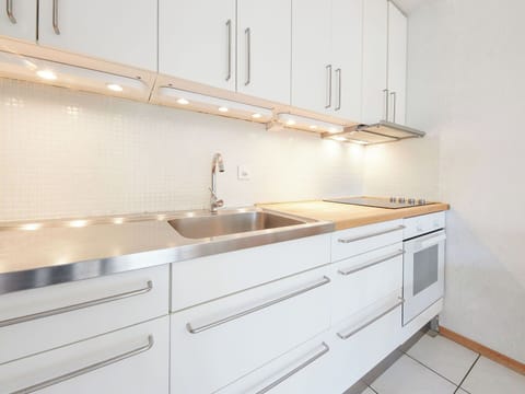 Kitchen, Flooring, Wood, Interior Design, Countertop, Floor, Cabinetry, Ceiling, Plumbing Fixture, Kitchen Sink