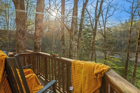 Deck: Sip morning coffee amidst nature's grandeur with stunning views and tranquility!