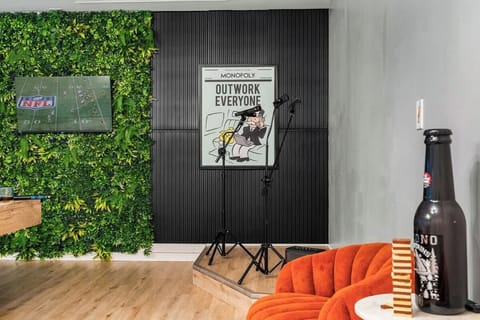 Mini stage corner ready for karaoke nights and group entertainment.