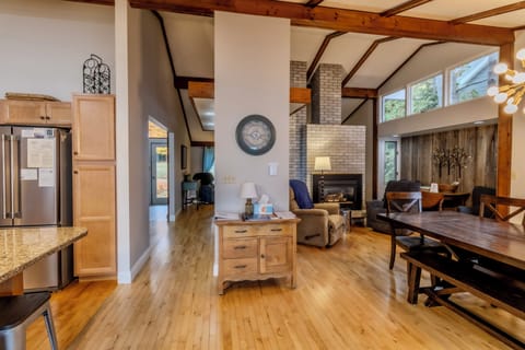 Living Room and Dining Room - You can see the entry door far back on the left