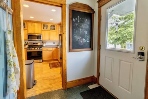 Entry - The entry door is on the right. Entry to the kitchen on the left side.