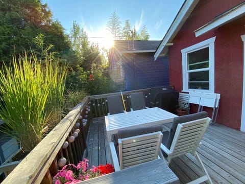 Back deck with extendable table and Webber BBQ.