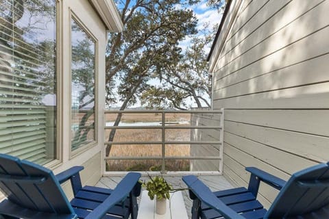 Enjoy morning coffee or an evening cocktail while gazing at the gorgeous marsh view