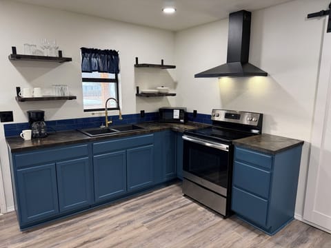 Spacious full kitchen perfect for family breakfasts, home-cooked dinners