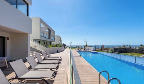 Communal pool with stunning scenic views.