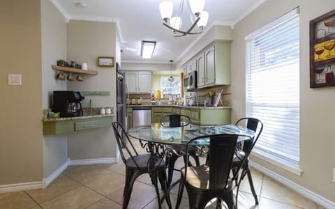 Cook, gather, and linger a little longer in this fully stocked kitchen.