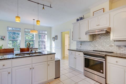 Kitchen | Gas Range | Tile Backsplash & Window Light