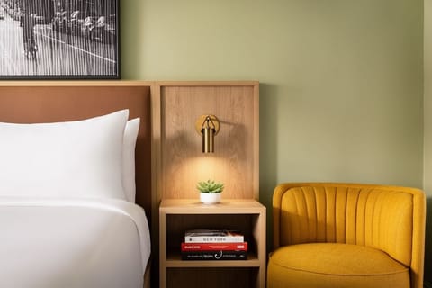 Unwind with warm reading light and a cozy accent chair.