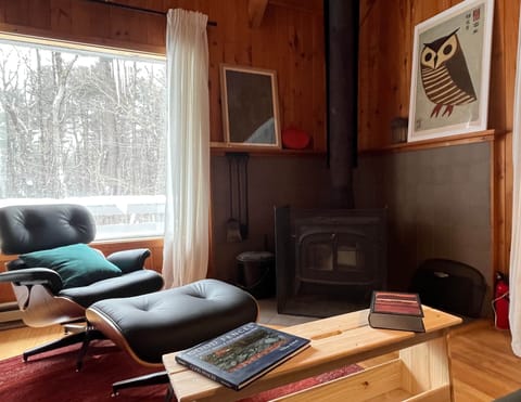 Relax in front of the wood stove, watch the snow fall, and read a good book.