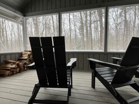 Sit and overlook the woods and sunsets from the 3-season porch.