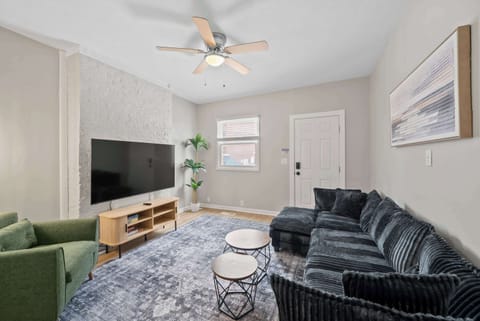 Unwind in the chic living room & stream your favorites on the smart TV​