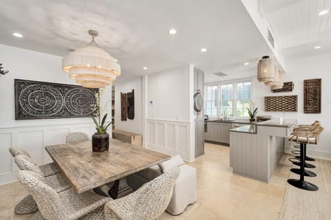 Relax in your elegant open-concept space where handcrafted details meet modern comfort—perfect for morning coffee or evening gatherings with loved ones.