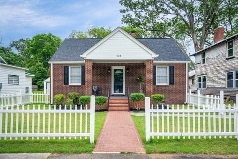 Please excuse the house next door. It was built in 1903 and is 121 years old.  We are currently restoring it and will be our next Airbnb. 