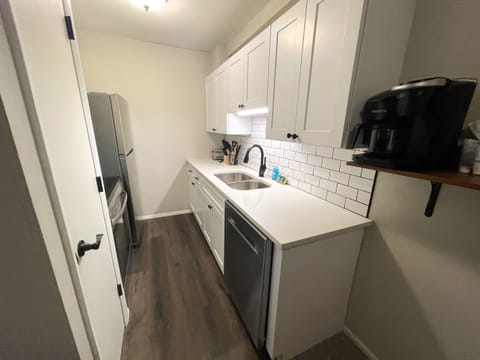 Kitchen with full size appliances and dishwasher