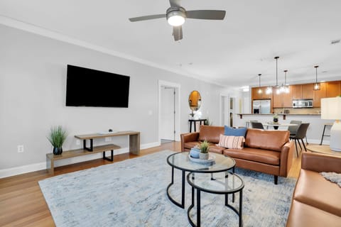 Open-concept living with stylish comfort and a seamless flow from kitchen to lounge — the heart of your stay awaits.