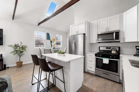 Airy open-concept space that keeps everyone connected while relaxing or dining.