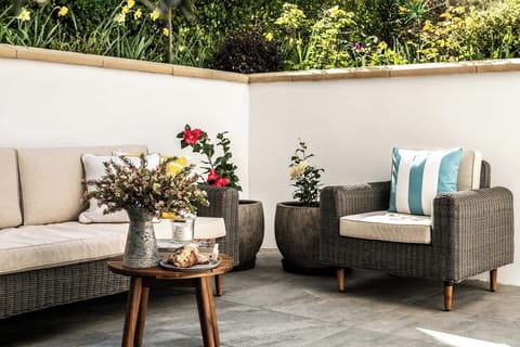 Your own private courtyard escape, tucked away, sun-soaked, and impossibly quiet.