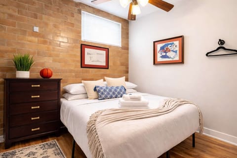 Bedroom 1: Rest comfortably in this inviting bedroom featuring a plush king bed, cozy linens, and a relaxing atmosphere designed for peaceful nights and easy mornings.