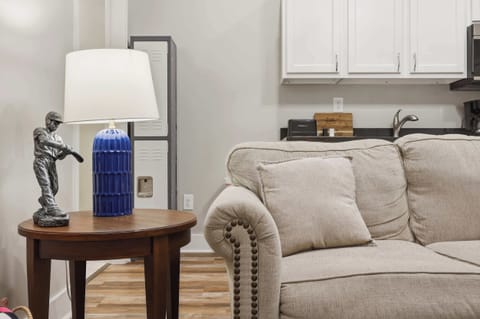 Unit 3 Living Area: Relax in this cozy living space with kitchenette, perfect for unwinding after exploring Churchill Downs and Louisville’s top eateries nearby.