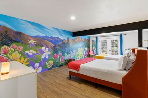 Hannah's Hideaway bedroom with mural