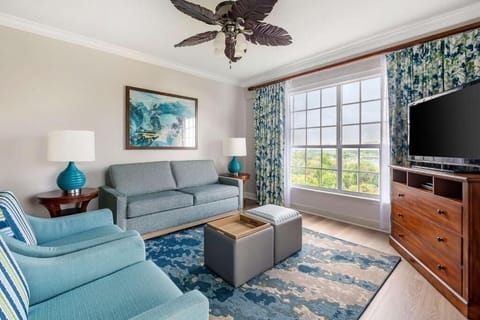 Lounge by the picture window and soak in scenic views.