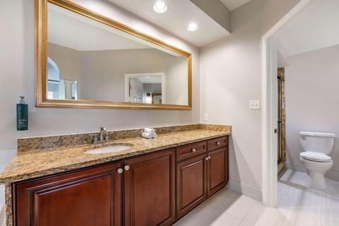 Freshen up with a wide vanity and clean finishes.