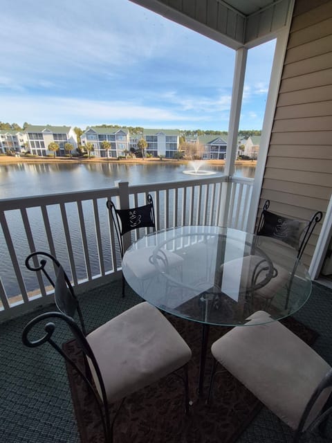 summer, balcony, screened porch outdoor, body of water, outdoor dining,