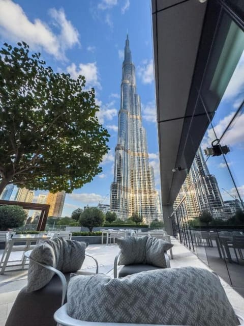 Exterior View: Experience unparalleled luxury with this breathtaking, close-up view of the magnificent Burj Khalifa from the building`s exclusive outdoor amenity area.