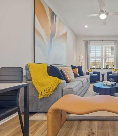 Welcome to The Sunset - part of the Hazy Collection. This stylish & modern Atlanta new-construction townhome near Grant Park & Zoo Atlanta is featuring a bright open-concept living space designed for comfort and extended stays.