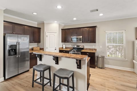 Full Kitchen with Cookware and Dishes