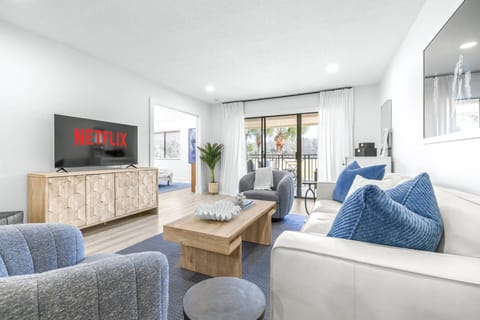 Living room opens to a private balcony, bringing in fresh air and natural light throughout the day.