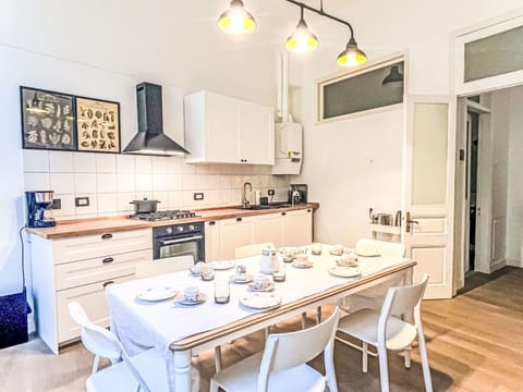 Furniture, Interior Design, Flooring, Ceiling, Wood, Floor, Kitchen, Room, Lighting, Kitchen Appliance