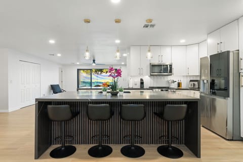 Open-concept kitchen/living/dining areas ideal for large groups