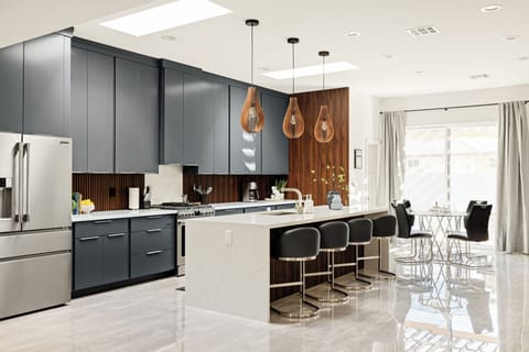 Fully Stocked Kitchen with Large Island for Entertaining