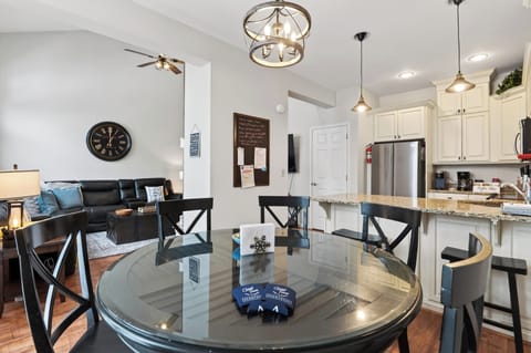 Seamless flow between the dining area and the breakfast bar.