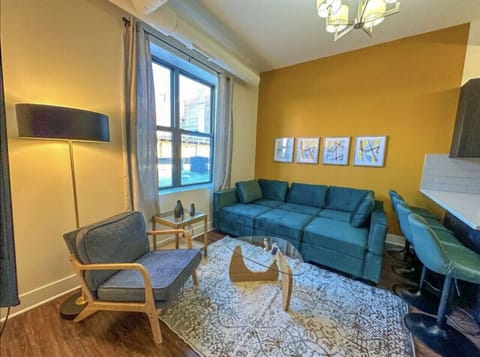 Cozy living room with comfortable seating and warm décor.