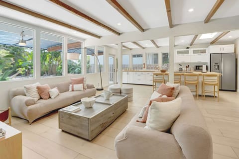 Relax in the spacious living room with cozy seating and a smart TV for your favorite shows.