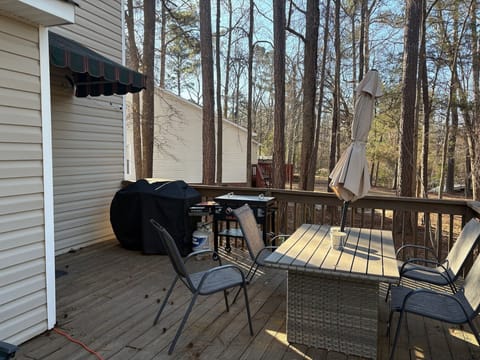 Back deck with grill, Blackstone grill, and seating area