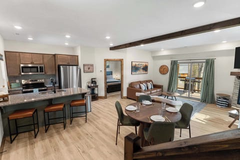 The open-concept allows everyone to enjoy the fun, whether in the kitchen or the living room!