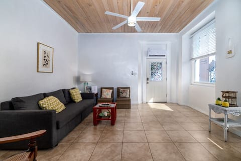 The spacious, comfy living room with flatscreen TV