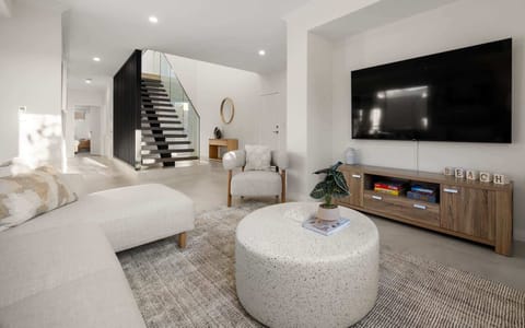 Downstairs Living - Air Conditioning, Entertainment Area, Smart TV, Heating, Board Games