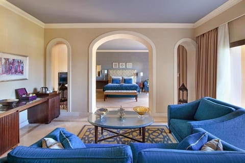 Gather for late-night chats in the elegant living area.