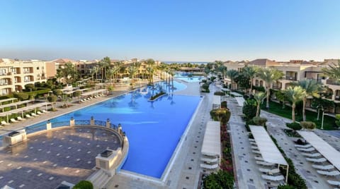 Picture your getaway across lush courtyards and sweeping pool views.