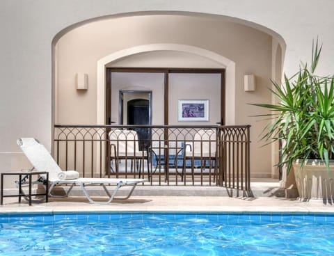 Soak up sunshine poolside with loungers just steps away.
